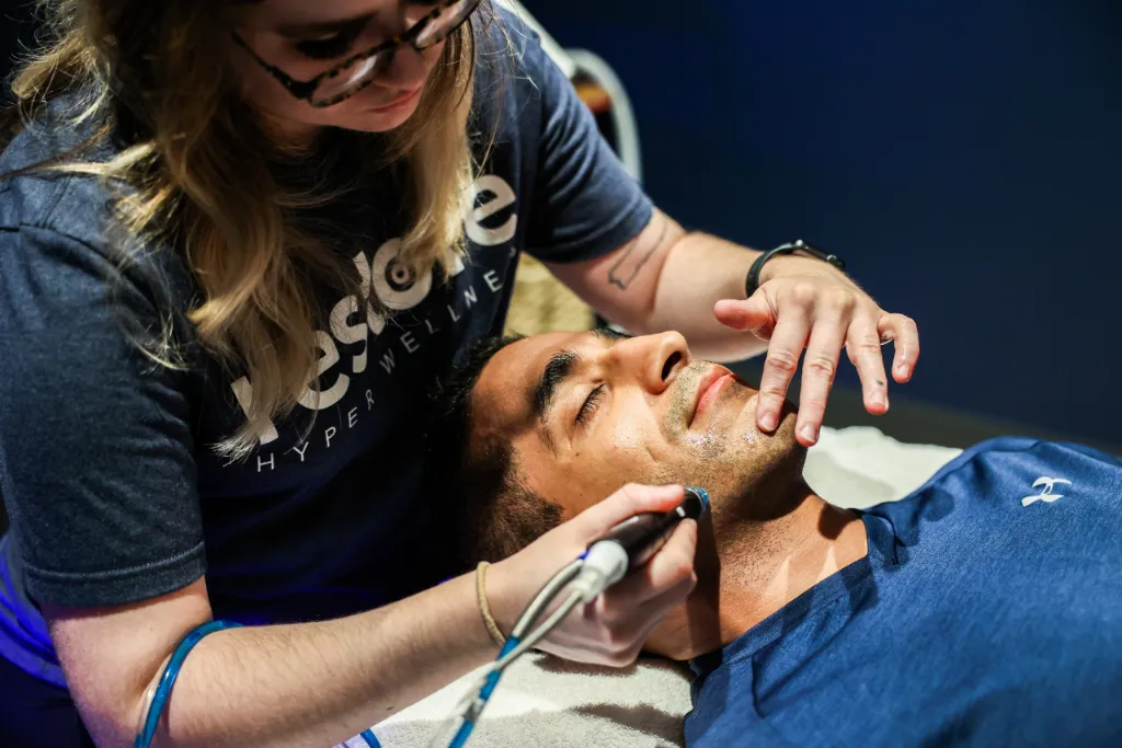 Man laying down during treatment.